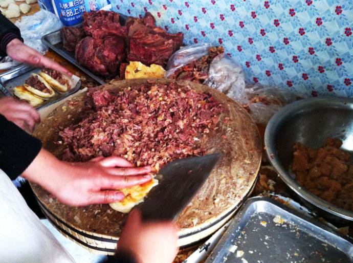 驴肉火烧80元一斤火烧成本,驴肉火烧6元一个是真的吗