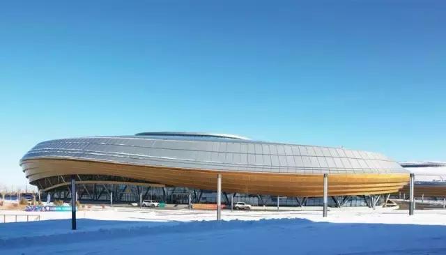 梅洪元丝路花谷孕育寒地建筑第十三届全国冬季运动会冰上运动中心