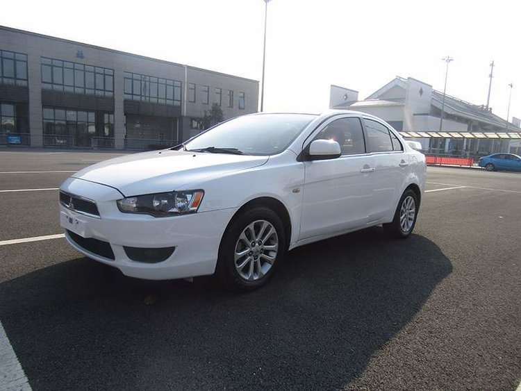 三菱evo油箱盖和翼神的区别,evo民用汽车