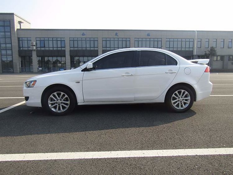 三菱evo油箱盖和翼神的区别,evo民用汽车