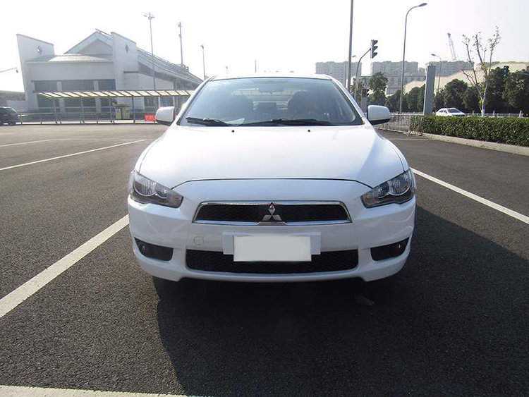 三菱evo油箱盖和翼神的区别,evo民用汽车