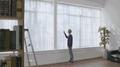 懒出新高度，继激光投影手机后，激光尺坐着也可测高楼！