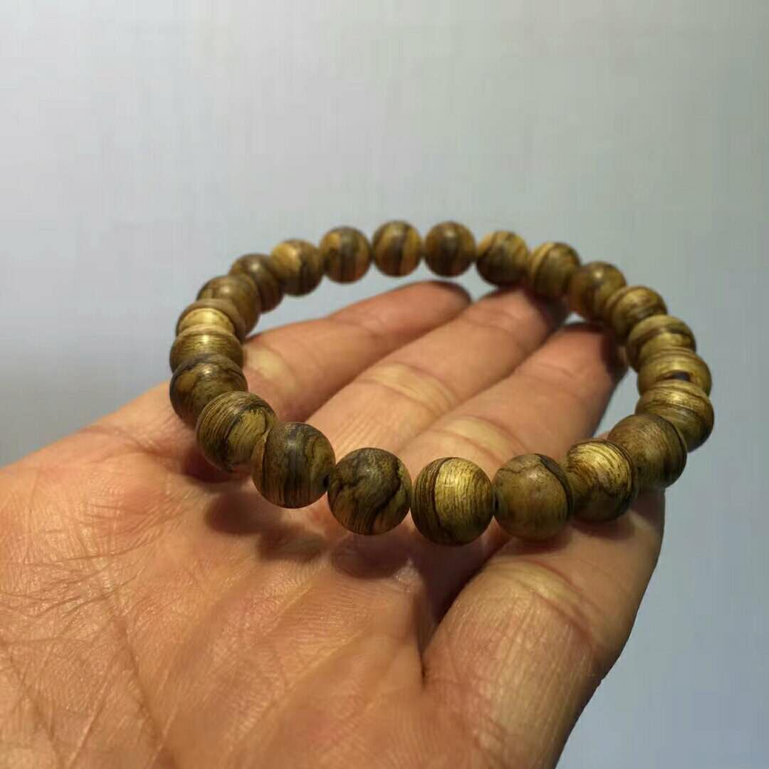 加里曼丹沉香手串有什么寓意,加里曼丹沉香108颗手串怎么搭配