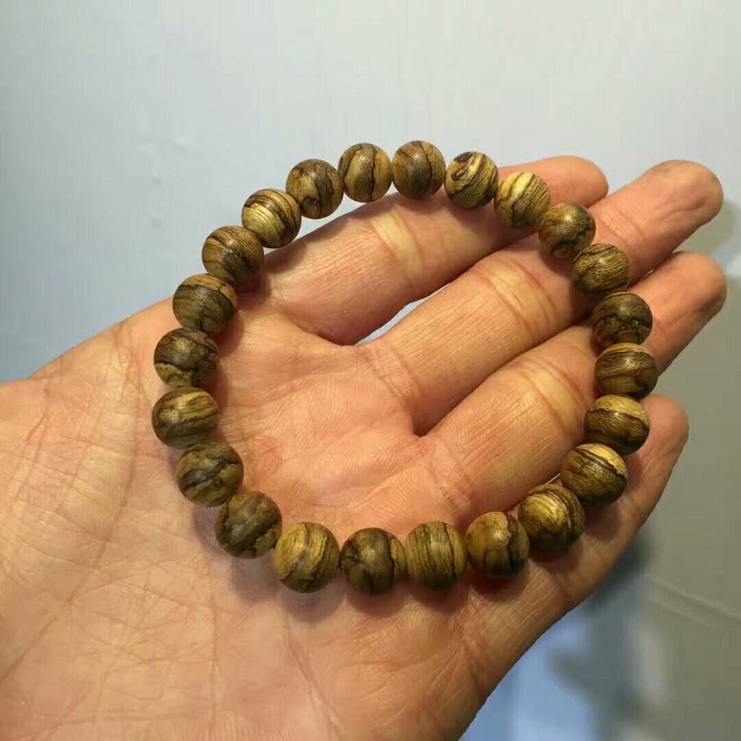 加里曼丹沉香手串有什么寓意,加里曼丹沉香108颗手串怎么搭配