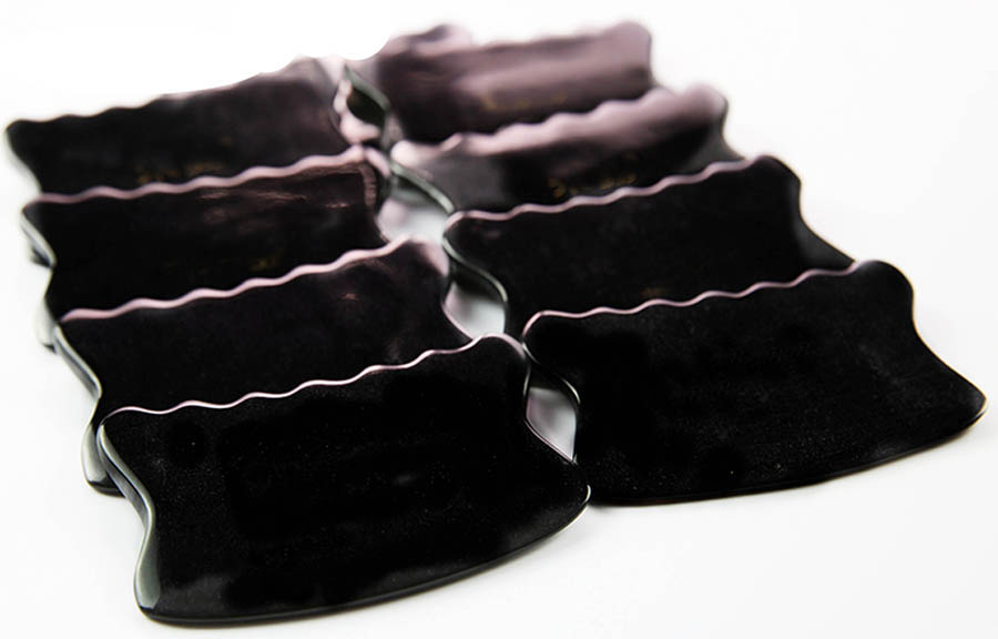 什么材质的刮痧板刮腹部效果好,刮痧板材质大比拼