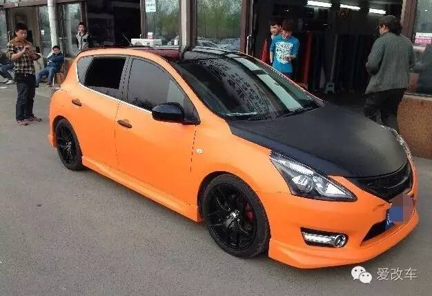 日产骐达中央扶手箱改装,日产的小精灵骐达改装案例