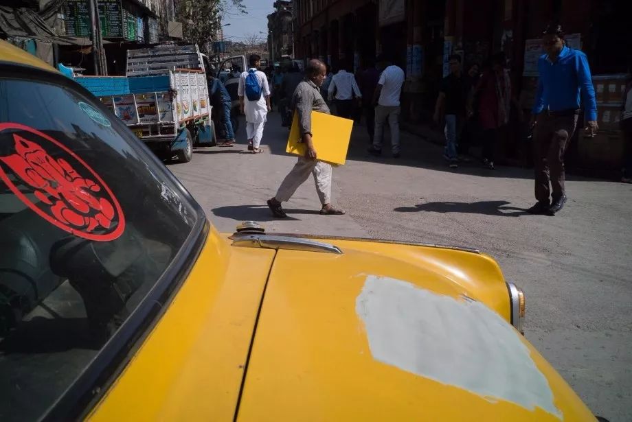 一个按快门的人,一个只会按快门的家伙