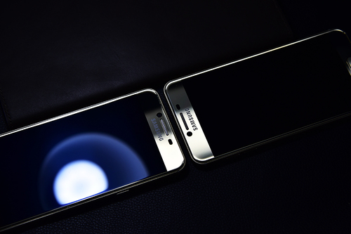 2千块买华为还是买三星,2千多买个二手手机值得吗