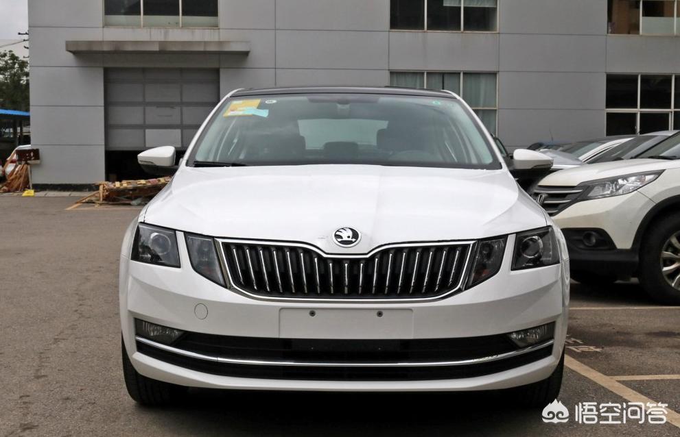 2010年斯柯达明锐1.4t手动逸俊版,大众斯柯达明锐2015款1.4t糖果白