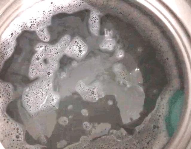 荣事达全自动洗衣机怎么清理垃圾,滚筒洗衣机怎么拆开清洗内部垃圾