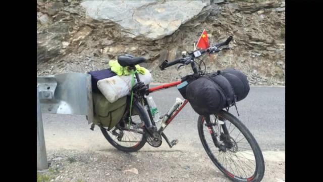 三年骑行六万公里世界很大嘉兴快递小哥想去看看